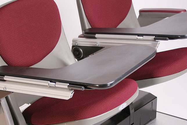 Retractable seating tablet arm