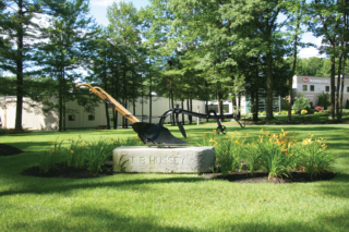 Hussey Seating headquarters and farming plow